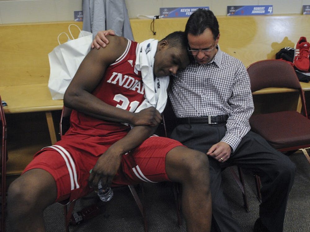 Head Coach Tom Crean consoles freshman center Thomas Bryant after the Hoosiers were eliminated from the NCAA tournament on Friday at the Wells Fargo Center. Indiana lost to North Carolina 101-86 on March 3, 2016.