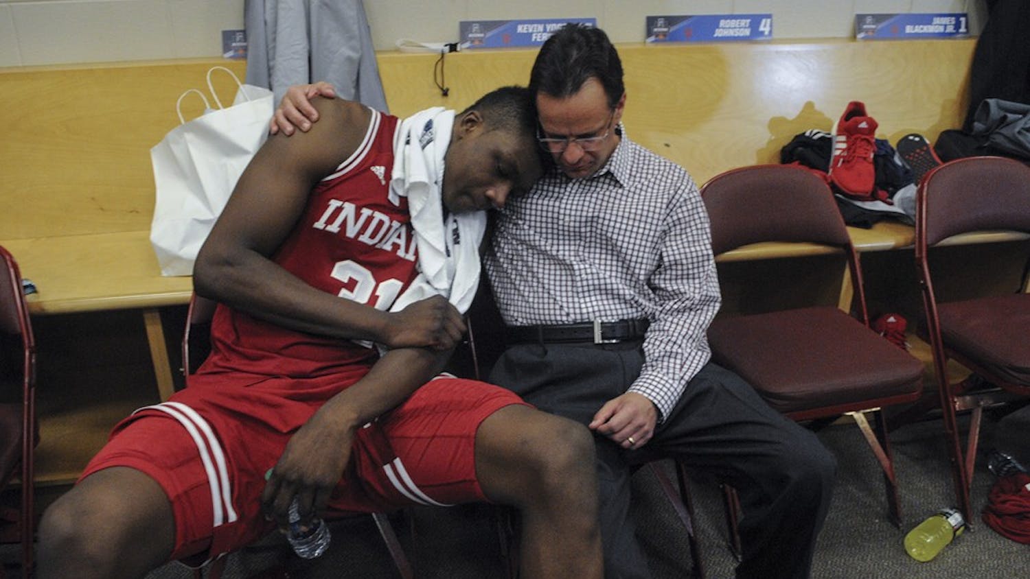 Head Coach Tom Crean consoles freshman center Thomas Bryant after the Hoosiers were eliminated from the NCAA tournament on Friday at the Wells Fargo Center. Indiana lost to North Carolina 101-86 on March 3, 2016.
