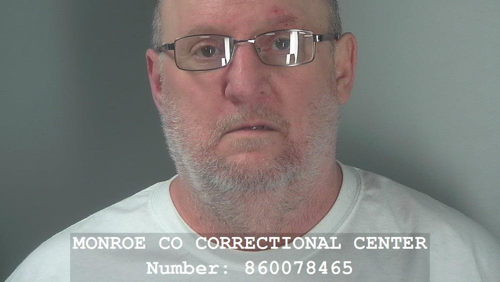 John Bryant, 59, is being held at the Monroe County Correctional Center on a murder charge. His girlfriend was found dead in his apartment with multiple stab wounds Monday and is believed to have been dead for several days.