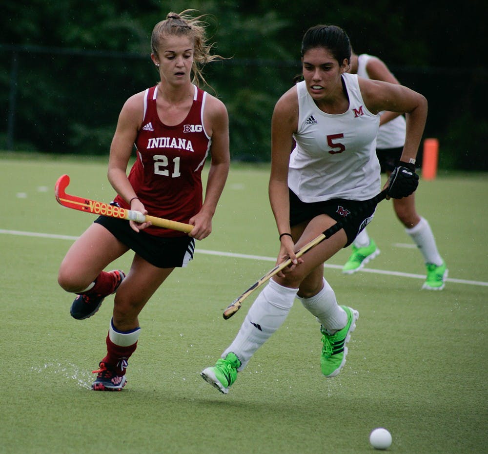 Sophomore Taylor Pearson, midfielder for Indiana, rushes for the ball against a Miami of Ohio player. The Hoosiers would go on to fall to Miami 3-1 on Friday, September 11th, at the IU Field Hockey Complex.