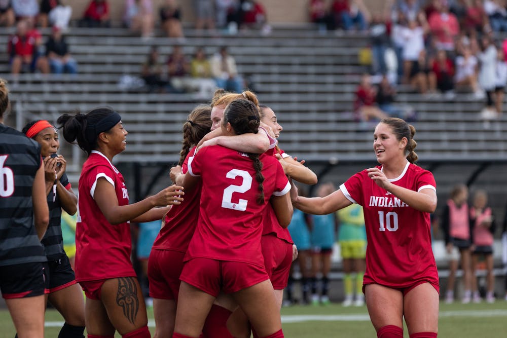 The Indiana women's soccer team celebrates a goal against Louisville on Sep. 7, 2023. Graduate forward Paige Webber scored two goals against Rutgers on Sunday.