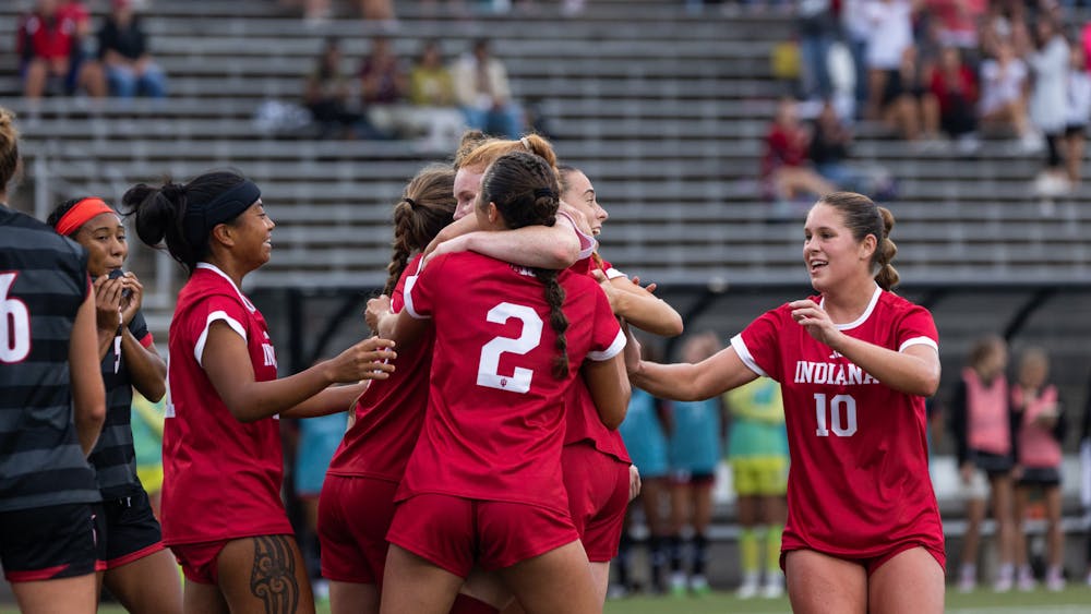The Indiana women's soccer team celebrates a goal against Louisville on Sep. 7, 2023. Graduate forward Paige Webber scored two goals against Rutgers on Sunday.