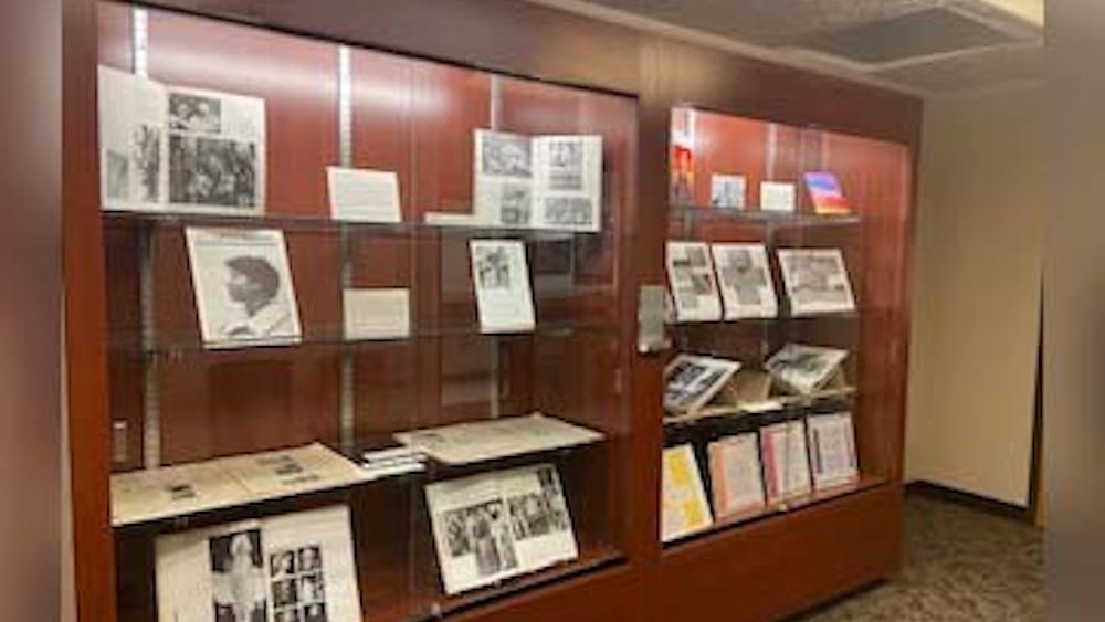An exhibit on the history of LGBTQ+ Student Life at IU is displayed at University Archives. The exhibit features some of the images, objects and stories of LGBTQ+ student life at IU Bloomington.