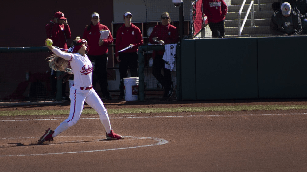 Senior pitcher Tara Trainer throws the opening pitch March 16 . IU will play Rutgers from April 26-28. 