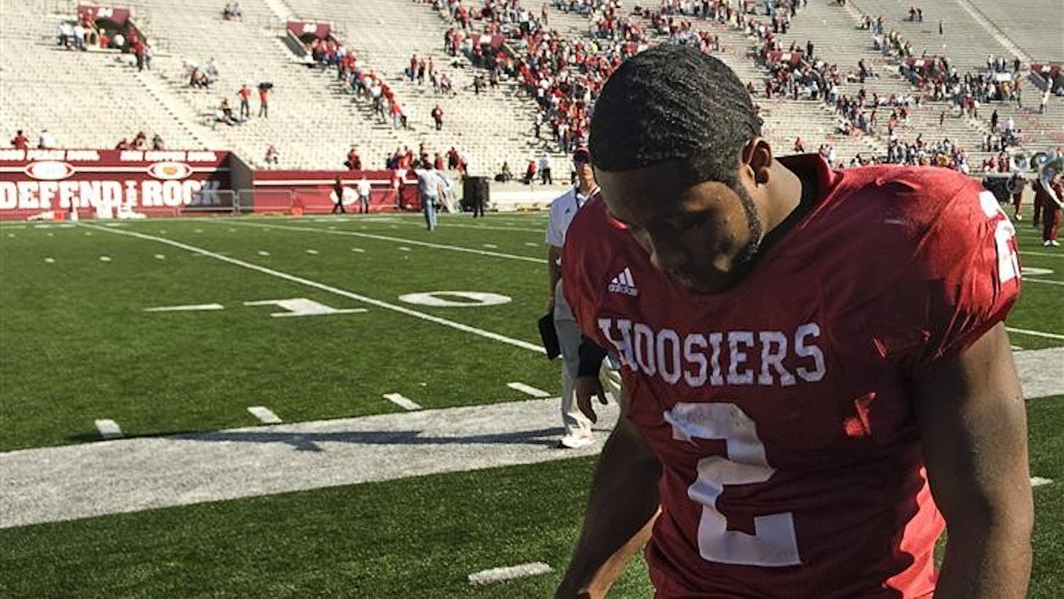 Senior running back Marcus Thigpen walks off the field following Indiana's 37-34 loss to Central Michigan on Saturday at Memorial Stadium.  Thigpen ran for 109 yards and two touchdowns.