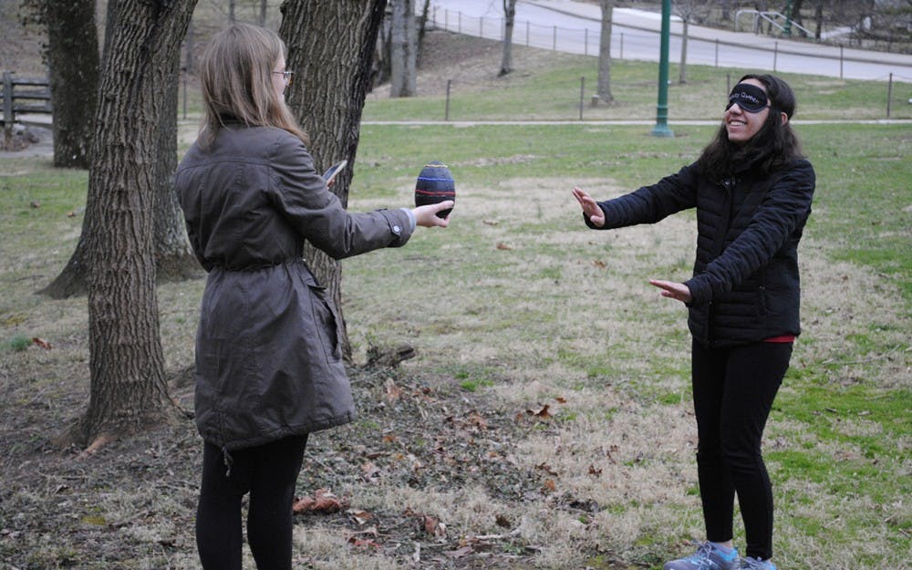 Amna Yaqub, the Hogwarts champion in the Triwizard Tournament, approaches her dragon egg decorated with the Hogwarts house colors. The Harry Potter Society at Indiana University organized a three-part tournament based off the popular book and movie series.