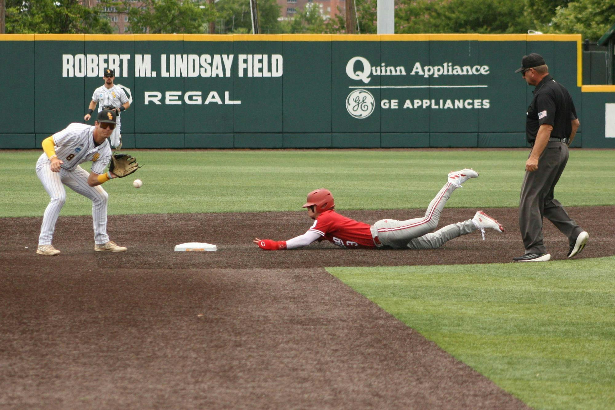 Indiana outfielder Carter Mathison dives into second base against the University of Southern Mississippi in the Knoxville Regional on May 31. Mathison went 2-for-5 in the Hoosiers' 10-4 victory.