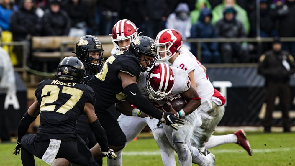 Purdue football players tackle then-freshman running back Sampson James on Nov. 30, 2019, at Ross-Ade Stadium in West Lafayette, Indiana. Indiana kicks off against Purdue at 3:30 p.m.