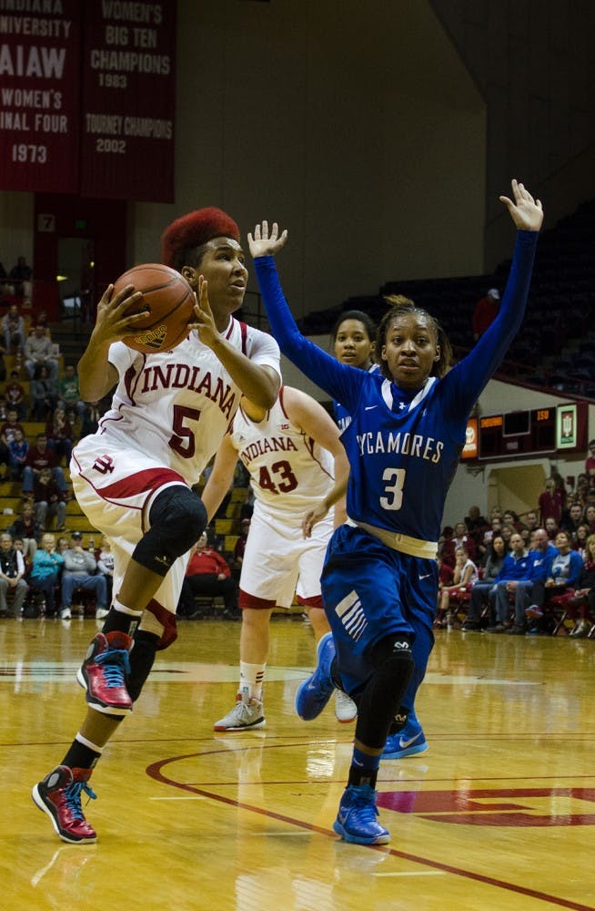 Sophomore guard Larryn Brooks attempts a layup during the Hoosier's game aginst Indiana State on Sunday. Indiana lost its first game of the season 65-61 in ovetime