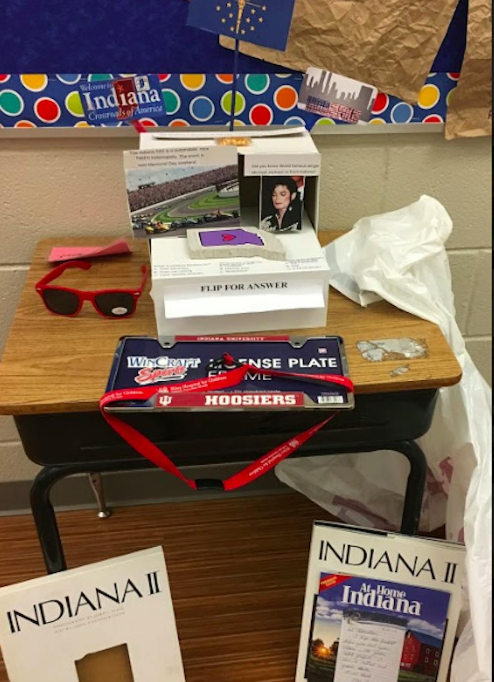 <p>A third-grade student, Sebastian, from The Langley School in McLean, Virginia, displays his project about the state of Indiana. Readers of the Indiana Daily Student, as well as others from around the state, submitted items and provided information to Sebastian to help him with his project.</p>