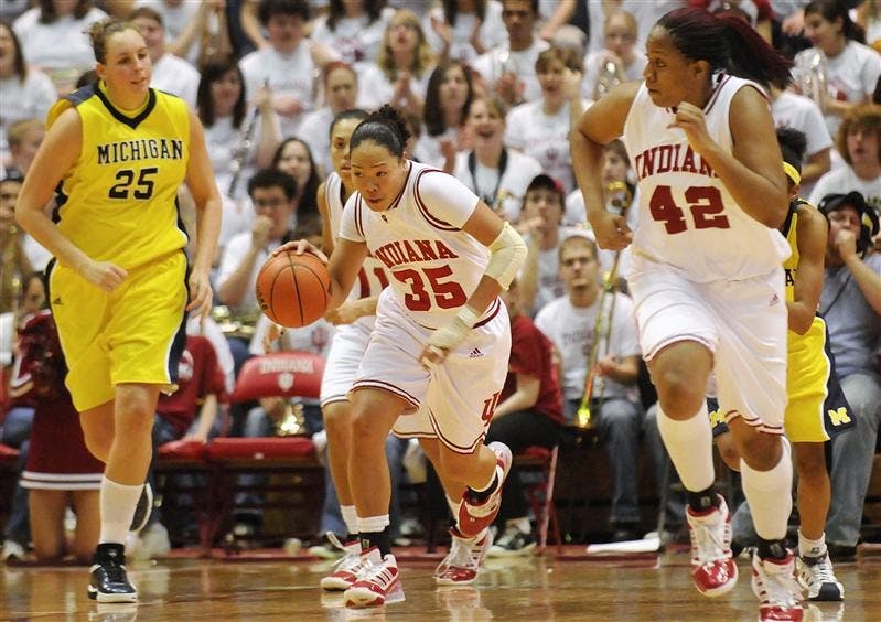 IU senior guard Kim Roberson, No. 35, looks up court on a fast break during IU's 67-61 win against Michigan on Sunday at Assembly Hall. Roberson was honored during a Senior Night ceremony after the game.