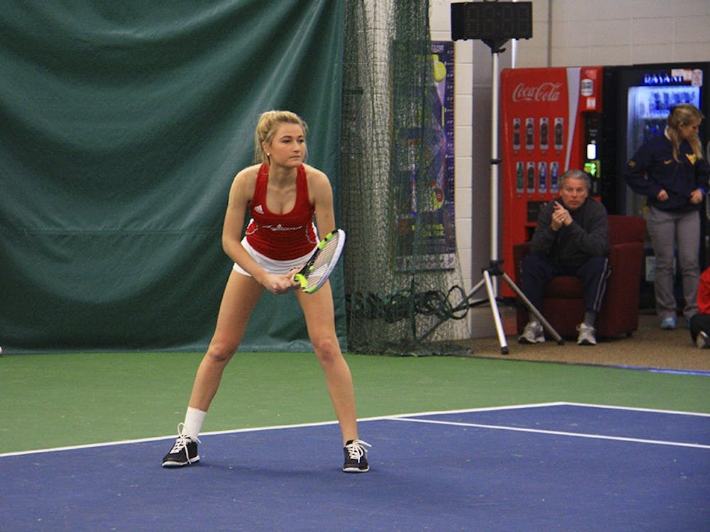 Women's tennis doubles, Senior Kim Schmider and Sophomore Madison Apple played against West Virginia on Saturday, March 4, 2017 at the IU Tennis Center. Apple was ready to receive the serve during the Hoosiers' 6-4 loss to West Virginia.