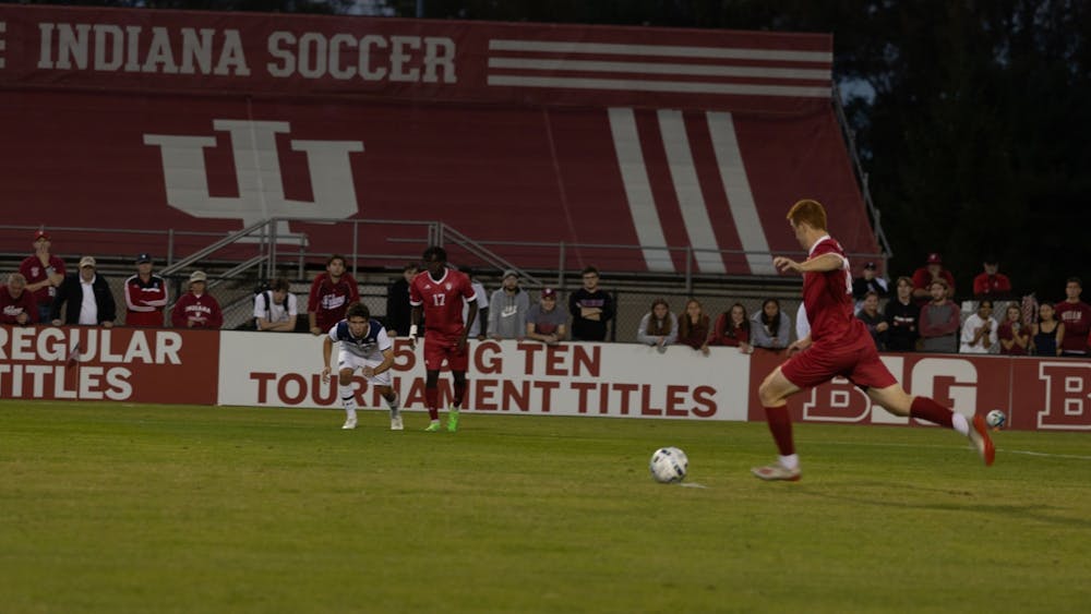 Redshirt senior forward Ryan Wittenbrink goes for a free kick against the University of Notre Dame at Bill Armstrong Stadium. The Hoosiers will travel to Piscataway, New Jersey, to face Rutgers at noon Oct. 9, 2022.
