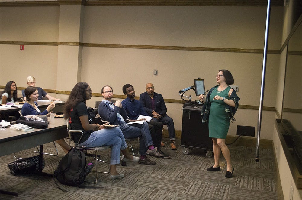 Vivian Halloran, associate professor of English and American studies, helps to lead one of five micro-lectures during the Black Lives Matter "Pop-Up Teach-In" event on Wednesday in the IMU's Oakely Room. The event was used to address topics of institutional racism and police brutality.