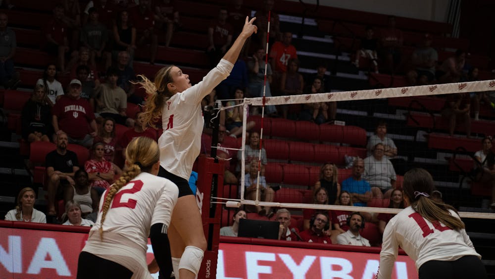 Junior outside hitter Mady Seris sends the ball over the net August 25, 2023, at Wilkinson Hall in Bloomington against New Hampshire. Indiana starts conference play against Illinois.