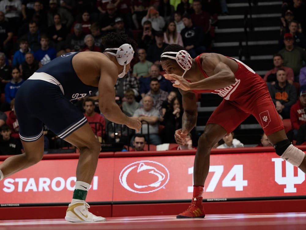 Indiana junior DJ Washington battles it out against Penn State's Starocci. Feb 5, 2023 Wilkinson Hall. The Hoosiers lost to Penn State 35-8.