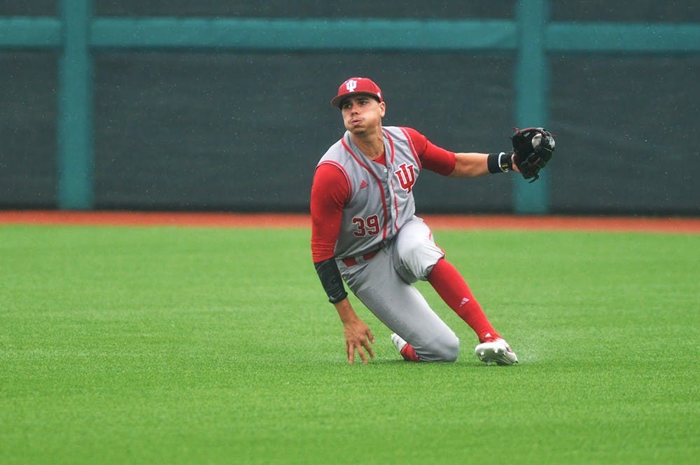 Senior outfielder Craig Dedelow jumps to his feet after a diving catch in right field against Minnesota on May 24, 2017 at Bart Kaufman Field. Dedelow was picked in the 9th round of the MLB draft by the Chicago White Sox.
