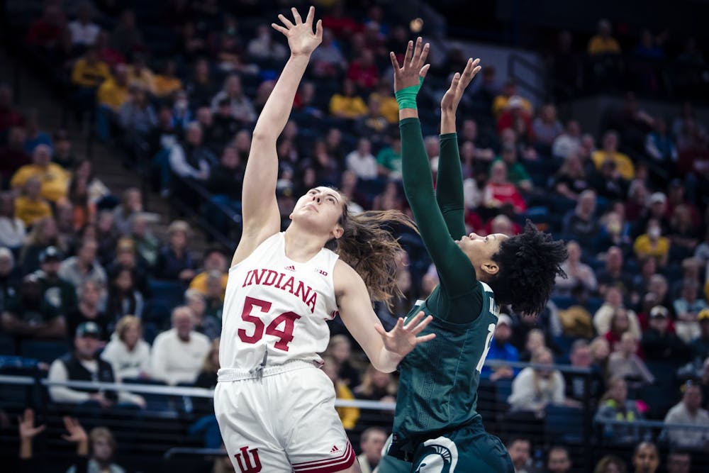 <p>Senior forward Mackenzie Holmes shoots a layup March 3, 2023, at the Target Center in Minneapolis, Minnesota. Indiana defeated Michigan State 94-85.</p>