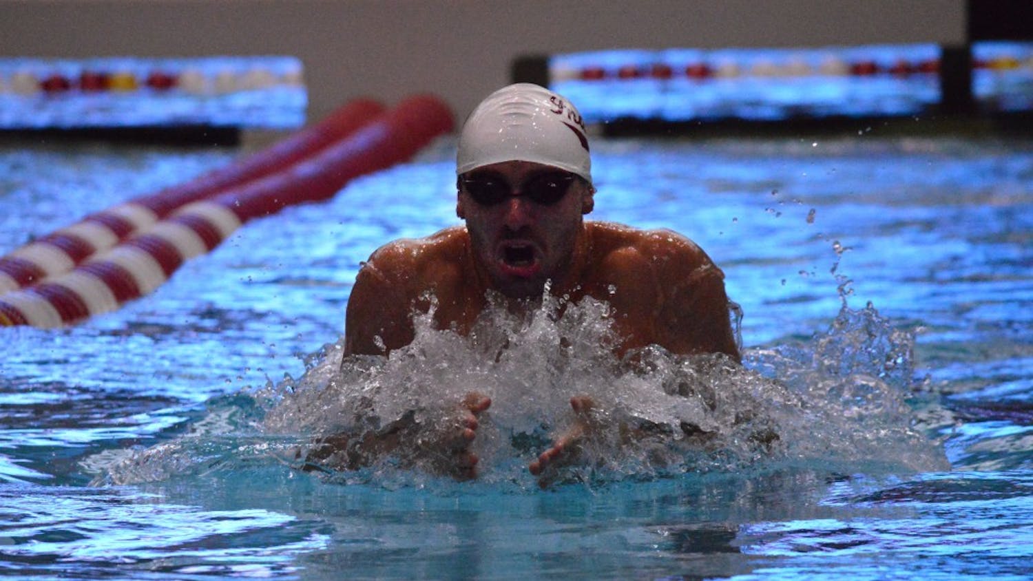 Then-sophomore Blake Pieroni dives off the starting block during the 100-yard breaststroke during a 2015 meet against Cincinnati at the Counsilman Billingsley Aquatic Center. Pieroni won the 100 freestyle at the Phillips 66 National Championships. 