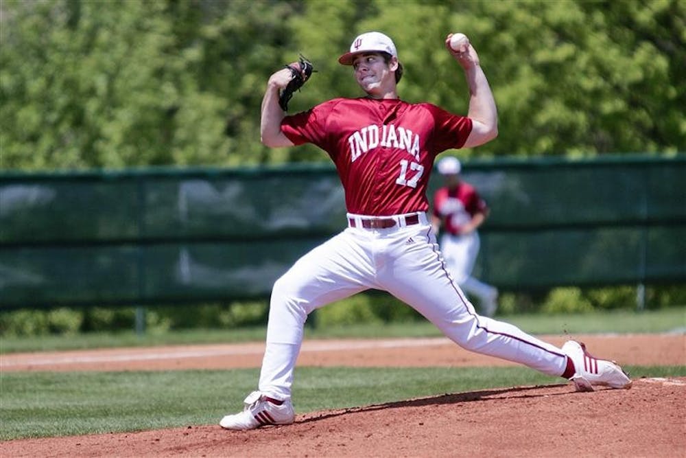 Freshman Blake Monar delivers a pitch against Northwestern on Sunday afternoon at Sembower Field. The Hoosiers defeated the Wildcats 11-2.