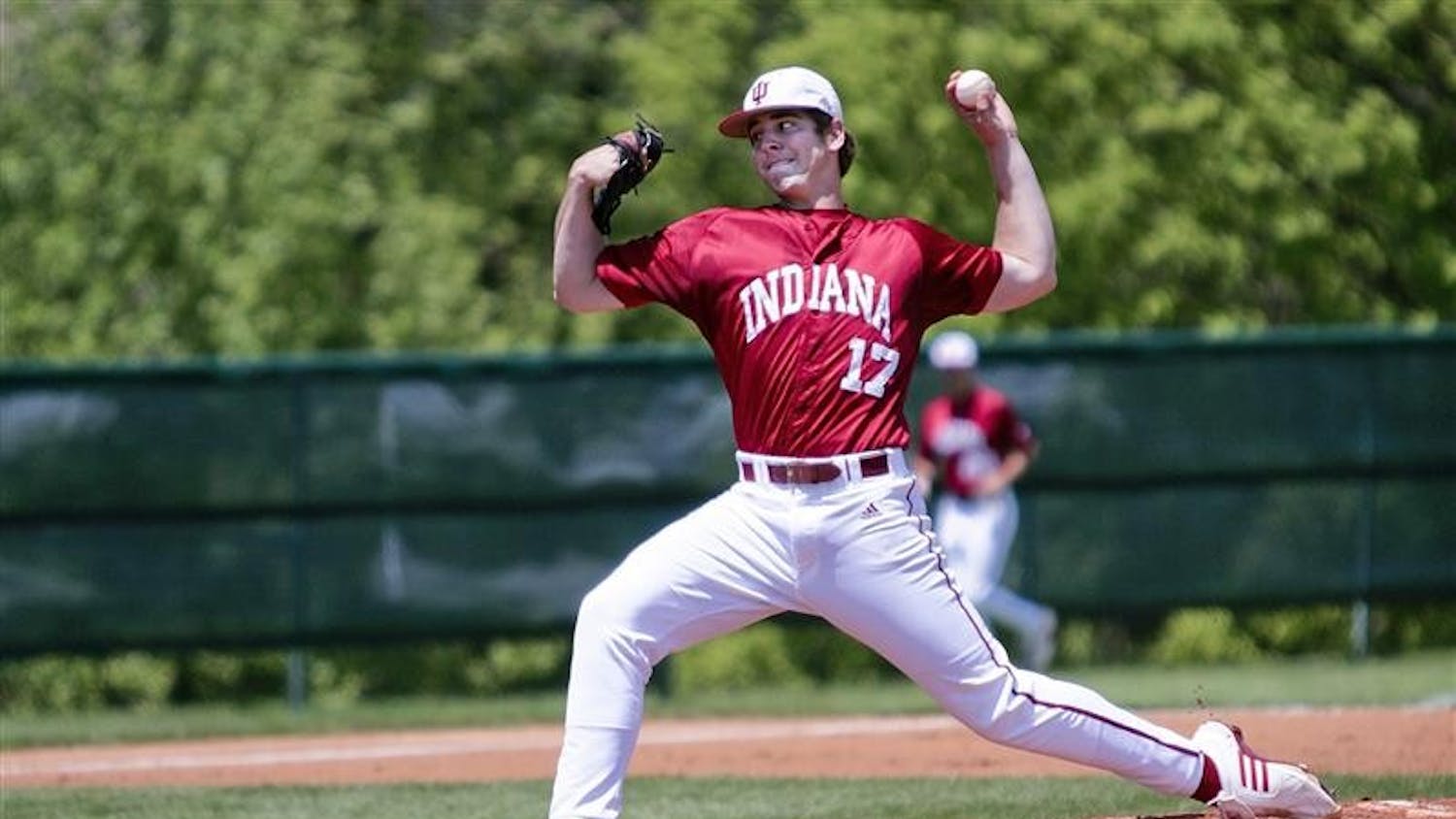 Freshman Blake Monar delivers a pitch against Northwestern on Sunday afternoon at Sembower Field. The Hoosiers defeated the Wildcats 11-2.