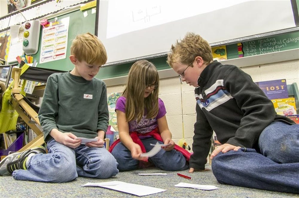 <p>Cody, Jalena and Justus count presidential votes from seven classes and faculty at Arlington Heights Elementary School on Nov. 2, 2012, in Mrs. Fox’s third grade class. According to a 2018 MIT study, researchers found it is close to impossible for people to achieve native-like proficiency in a language unless they start learning it by the age of 10.</p>