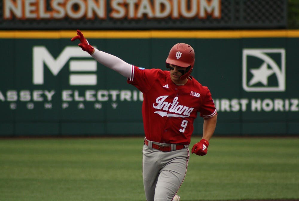 Indiana first baseman Brock Tibbitts celebrates a home run against the University of Southern Mississippi in the Knoxville Regional on May 31. Tibbitts had 4 RBIs in Indiana's 10-4 win.