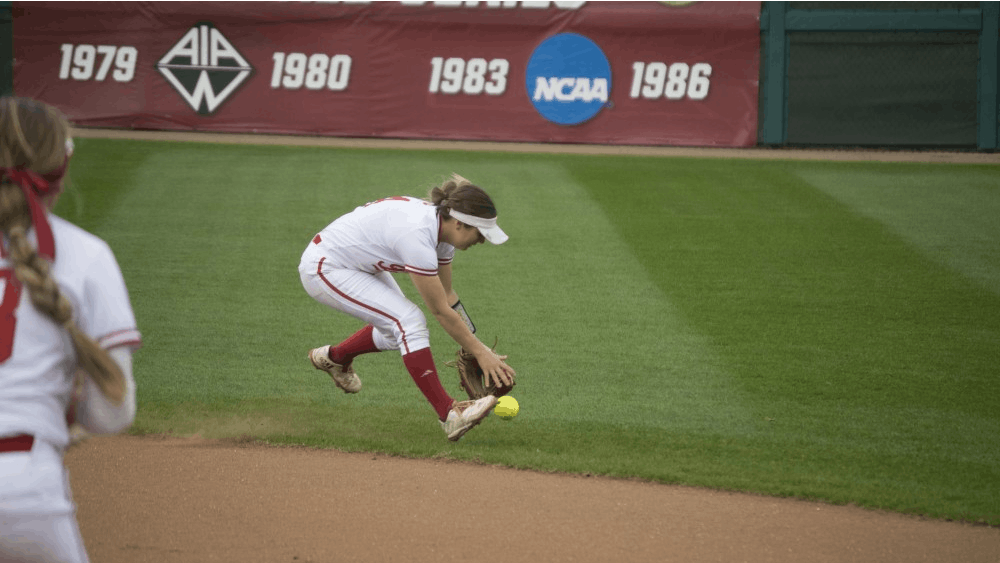 Second baseman Erin Lehman fields a grounder in the gap in hopes of making a play at first during the second of two games against the Boilermakers on Tuesday. IU beat Purdue 4-0 in the first game while Purdue took the second 2-1.
