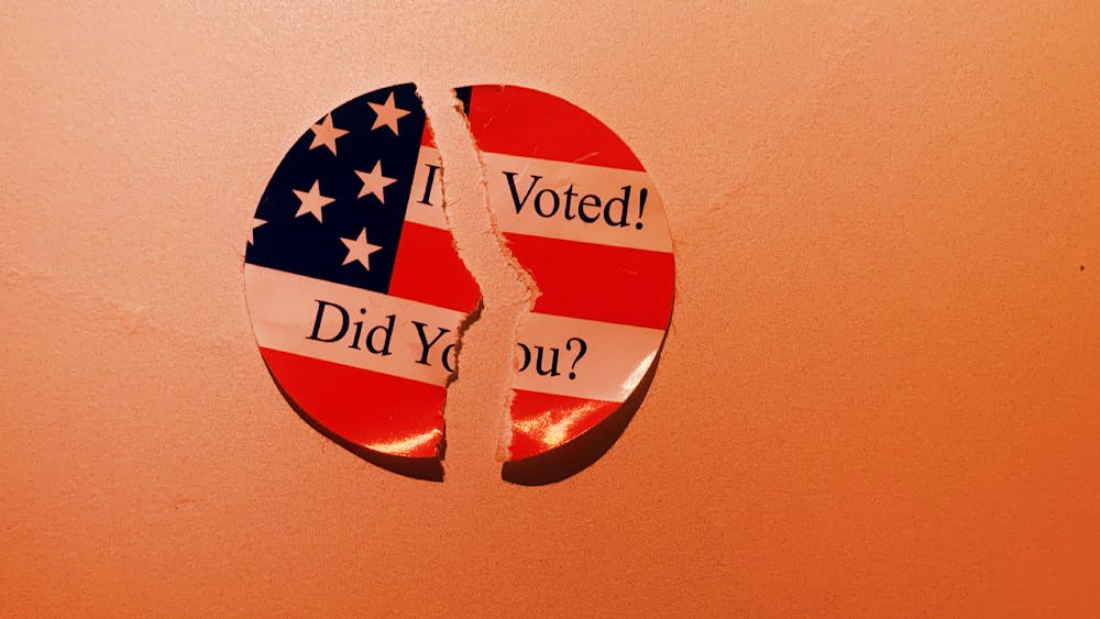 An I voted sticker torn in half