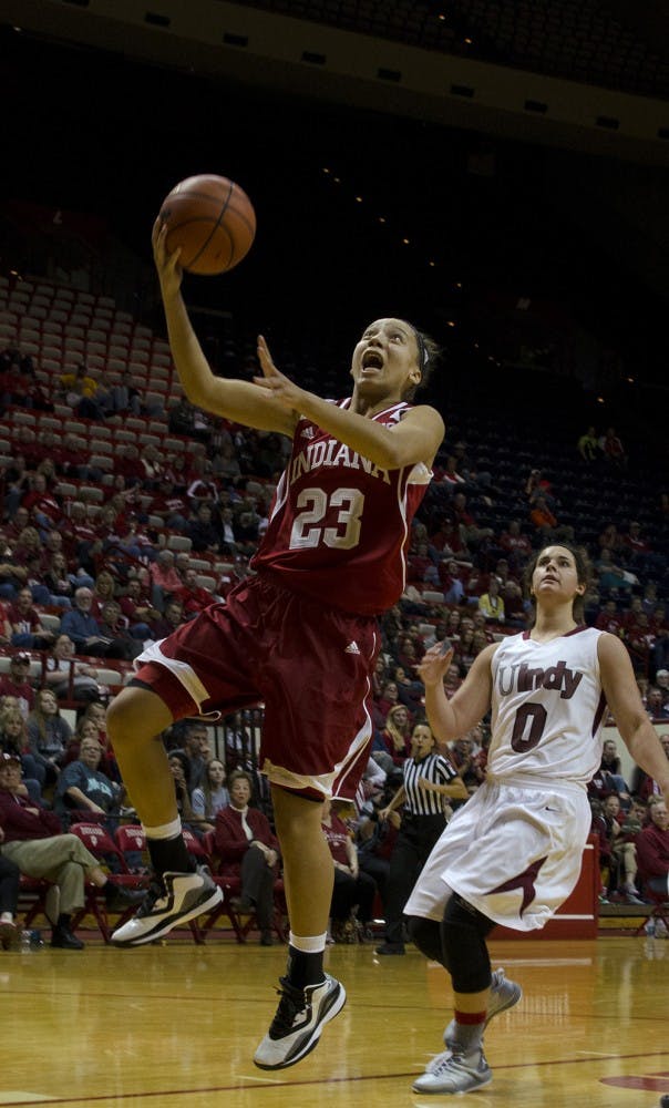 Sophomore Guard Alexis Gassion attempts a lay up during an exhibition game against the University of Indianapolis Sunday. IU won 88-49 and will play its first regular season game this upcoming Saturday against Gardner Webb.