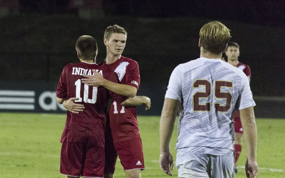 Tanner Thompson and Jeremiah Gutjahr celebrate after Thompson's goal lifted the Hoosiers to their 2-0 victory over IUPUI at Bill Armstrong Stadium.