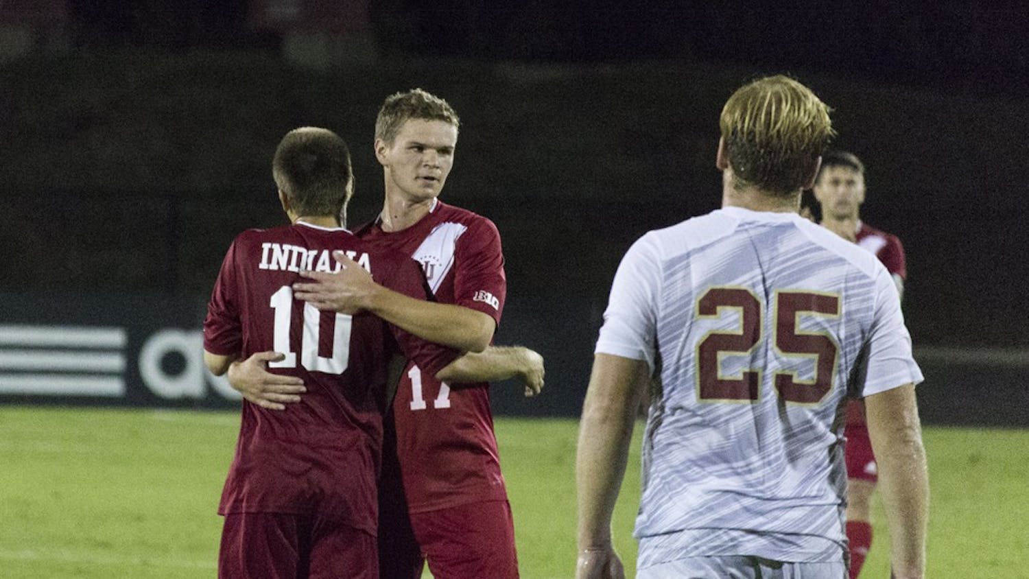 Tanner Thompson and Jeremiah Gutjahr celebrate after Thompson's goal lifted the Hoosiers to their 2-0 victory over IUPUI at Bill Armstrong Stadium.