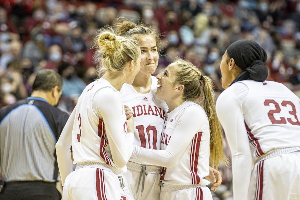 <p>Senior forward Aleksa Gulbe is embraced by teammates after blocking a shot to end the first quarter against Michigan State on Feb. 12, 2022, at Simon Skjodt Assembly Hall. Indiana will face Northwestern in its penultimate home game of the season on Thursday.</p>
