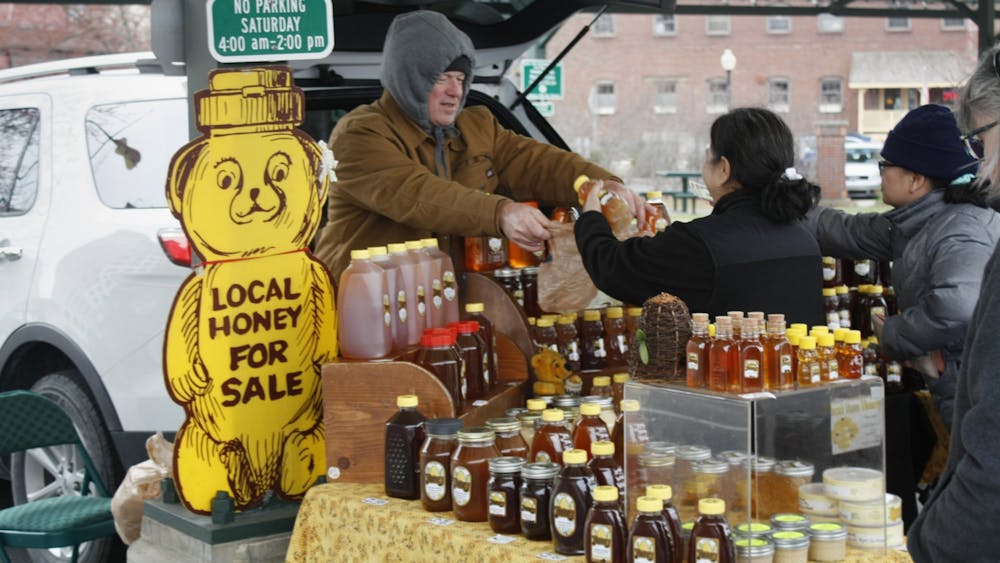 David Vadas is seen selling honey on April 2, 2022, at the Bloomington Community Farmers&#x27; Market. Three Bloomington farmers’ markets opened April 1 for the 2023 season and will run until the beginning of December.