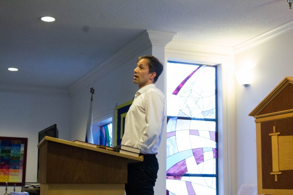 Günther Jikeli, associate professor or Jewish studies at IU, speaks to members of Pi Lambda Phi for an anti-Semitism talk Oct. 16 in the Helene G. Simon Hillel Center. Pi Lambda Phi organized its Elimination of Prejudice week, focusing on anti-Semitism due to remarks made on the website Greekrank on Aug. 29.