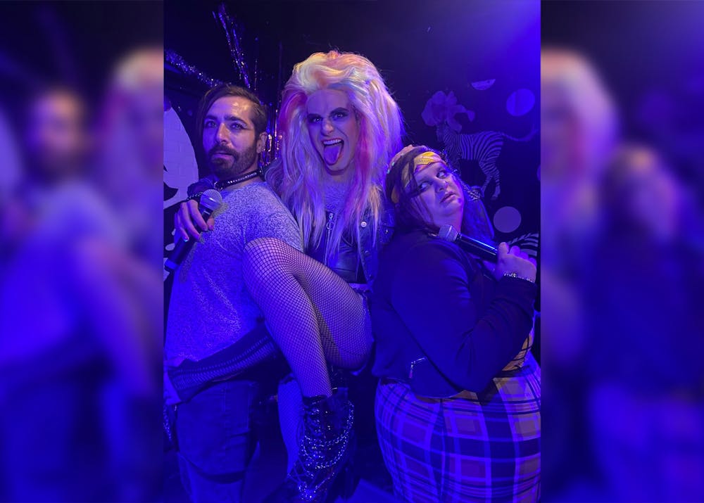 <p>Dan Kazemi, music director and keyboard player, James Rose, who plays Hedwig, and Paige Scott, who plays Yitzhak, pose for a picture. Cardinal Stage will present “Hedwig and the Angry Inch” on June 9-26 at the John Waldron Auditorium.</p>