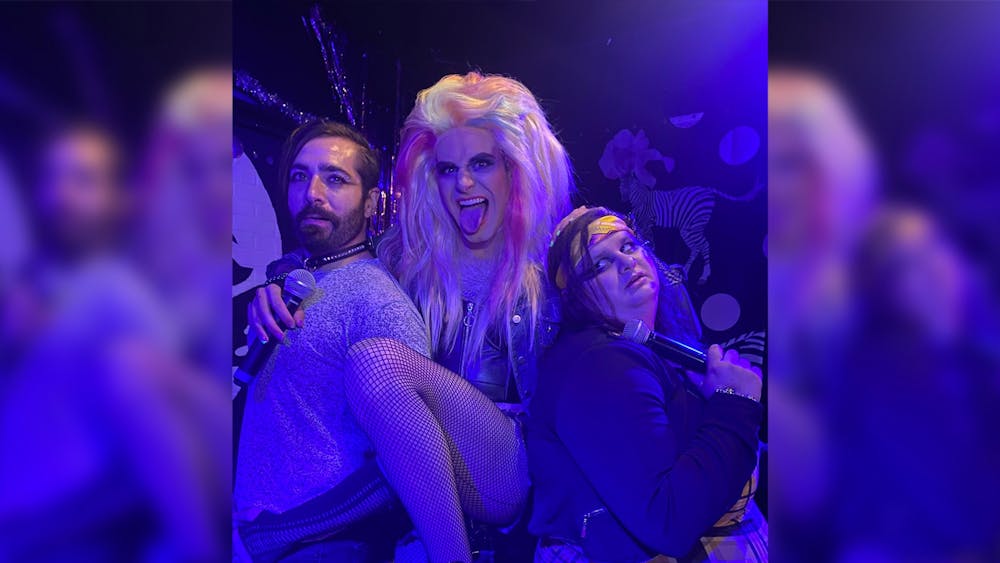 Dan Kazemi, music director and keyboard player, James Rose, who plays Hedwig, and Paige Scott, who plays Yitzhak, pose for a picture. Cardinal Stage will present “Hedwig and the Angry Inch” on June 9-26 at the John Waldron Auditorium.