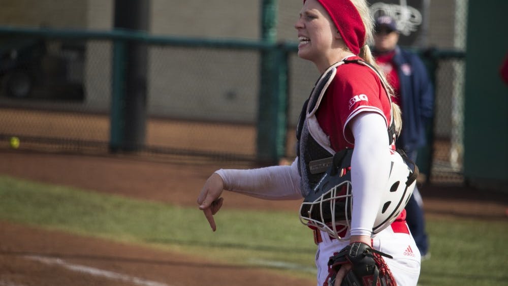 Then-freshman catcher Maddie Westmoreland, now a sophomore, yells to the outfield in the final inning of IU’s game March 18, 2018, against the University of Illinois at Chicago.