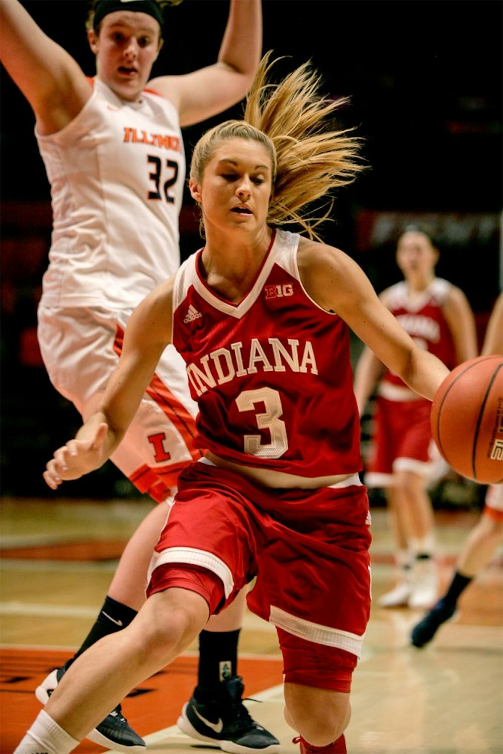 Sophomore guard Tyra Buss rushes down the court against Illinois. The Hoosiers defeated the Fighting Illini 80-68 Wednesday at the State Farm Center.