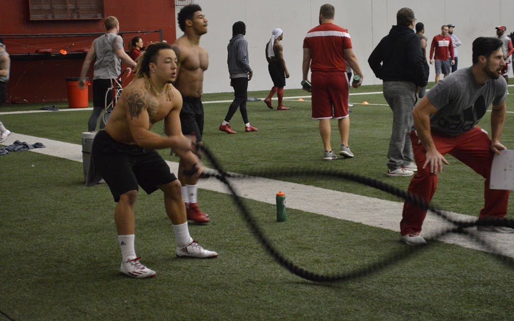 Sophomore Ricky Brookins runs through a rope session during winter football practice earlier this month. Brookins said despite the short amount of time running backs coach Mike Hart has been at IU, he's already brought changes to the program.