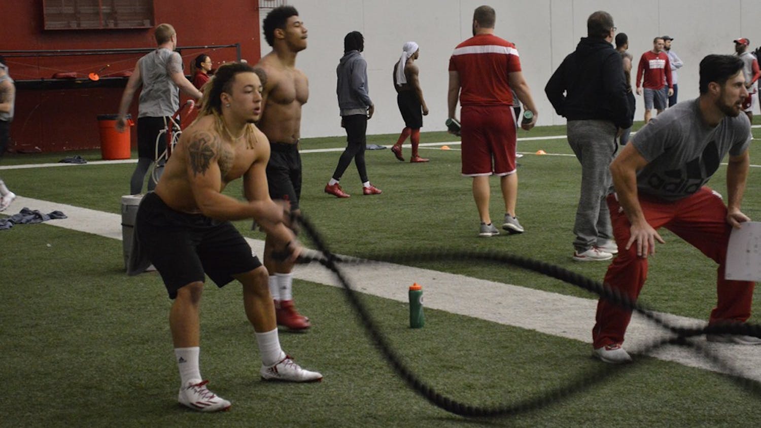 Sophomore Ricky Brookins runs through a rope session during winter football practice earlier this month. Brookins said despite the short amount of time running backs coach Mike Hart has been at IU, he's already brought changes to the program.
