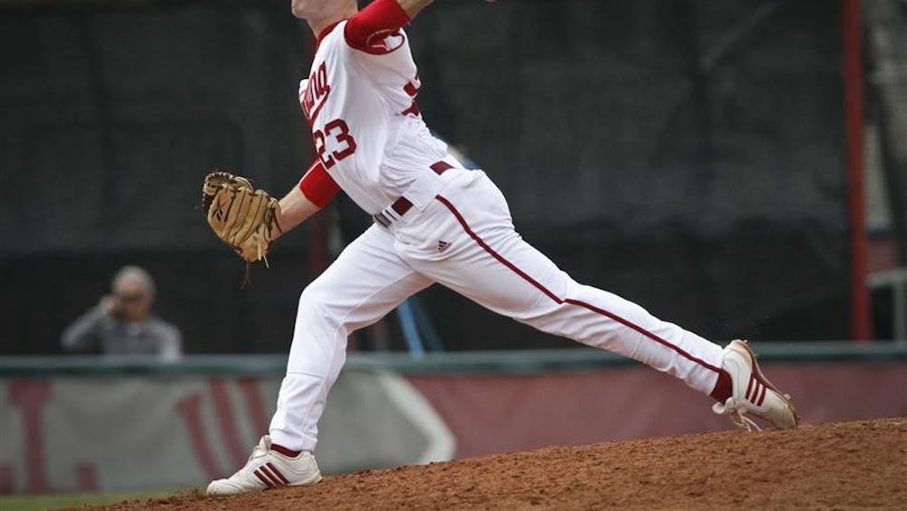 Sophomore pitcher Joey DeNato pitches the ball against the Michigan State Spartans on Friday at Sembower Field.