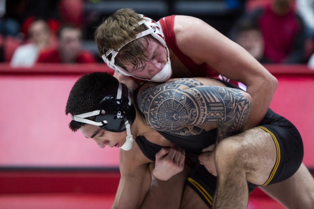 <p>Then-freshman Graham Rooks wrestles then-senior Pat Lugo Jan. 10, 2020, in Wilkinson Hall. Indiana fell 37-3 to Michigan on Friday and was defeated by Ohio State on Sunday. </p>