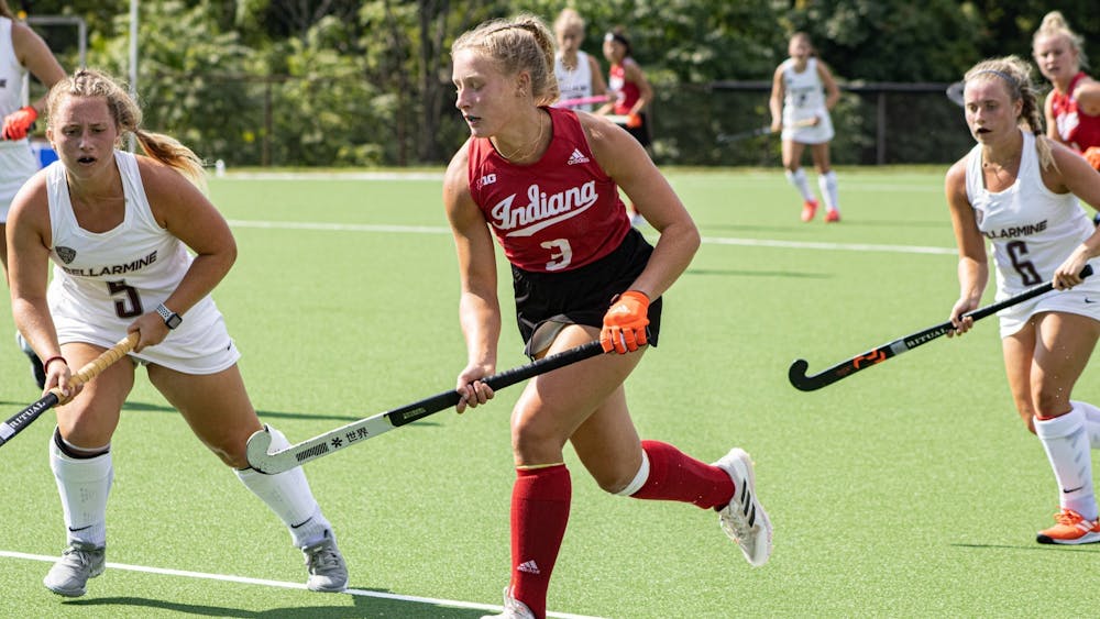 Freshman forward Kayla Kiwak runs with the ball during a match against Bellarmine University on Sept. 6, 2021, at the IU Field Hockey Complex. Kira Freshman midfielder Curland led the Hoosiers in goals and points.