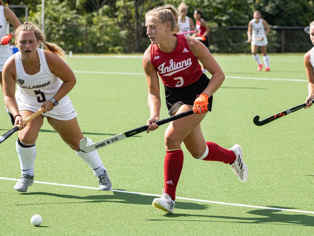 Freshman forward Kayla Kiwak runs with the ball during a match against Bellarmine University on Sept. 6, 2021, at the IU Field Hockey Complex. Kira Freshman midfielder Curland led the Hoosiers in goals and points.