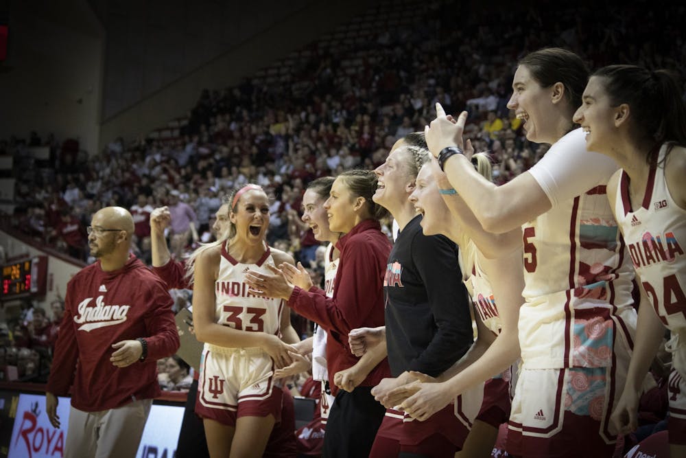 <p>The Hoosiers bench celebrates after a call against Michigan on Feb. 16, 2023, at Assembly Hall in Bloomington. The Hoosiers beat the Wolverines 68-52.</p>
