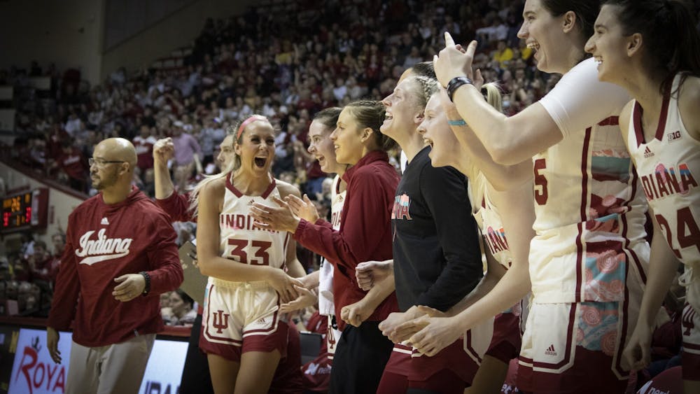 The Hoosiers bench celebrates after a call against Michigan on Feb. 16, 2023, at Assembly Hall in Bloomington. The Hoosiers beat the Wolverines 68-52.