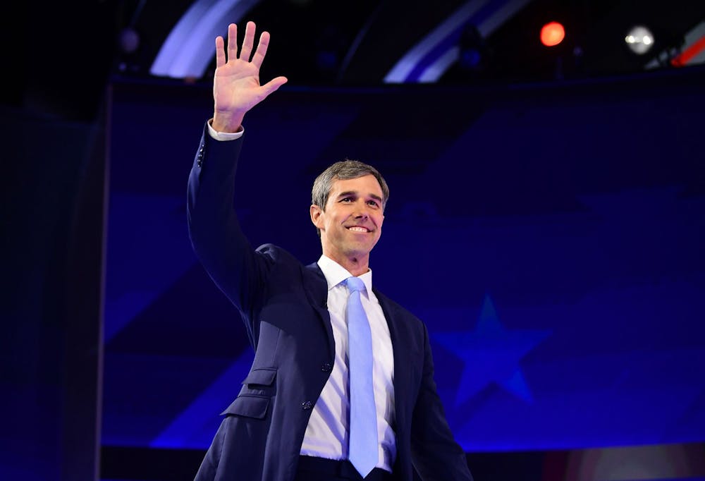 Beto O&#x27;Rourke, former Democratic presidential candidate and Texas representative, waves as he arrives onstage Sept. 12 during the third Democratic primary debate of the 2020 presidential campaign at Texas Southern University in Houston, Texas.