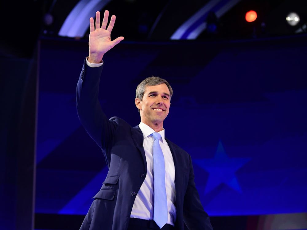 Beto O&#x27;Rourke, former Democratic presidential candidate and Texas representative, waves as he arrives onstage Sept. 12 during the third Democratic primary debate of the 2020 presidential campaign at Texas Southern University in Houston, Texas.