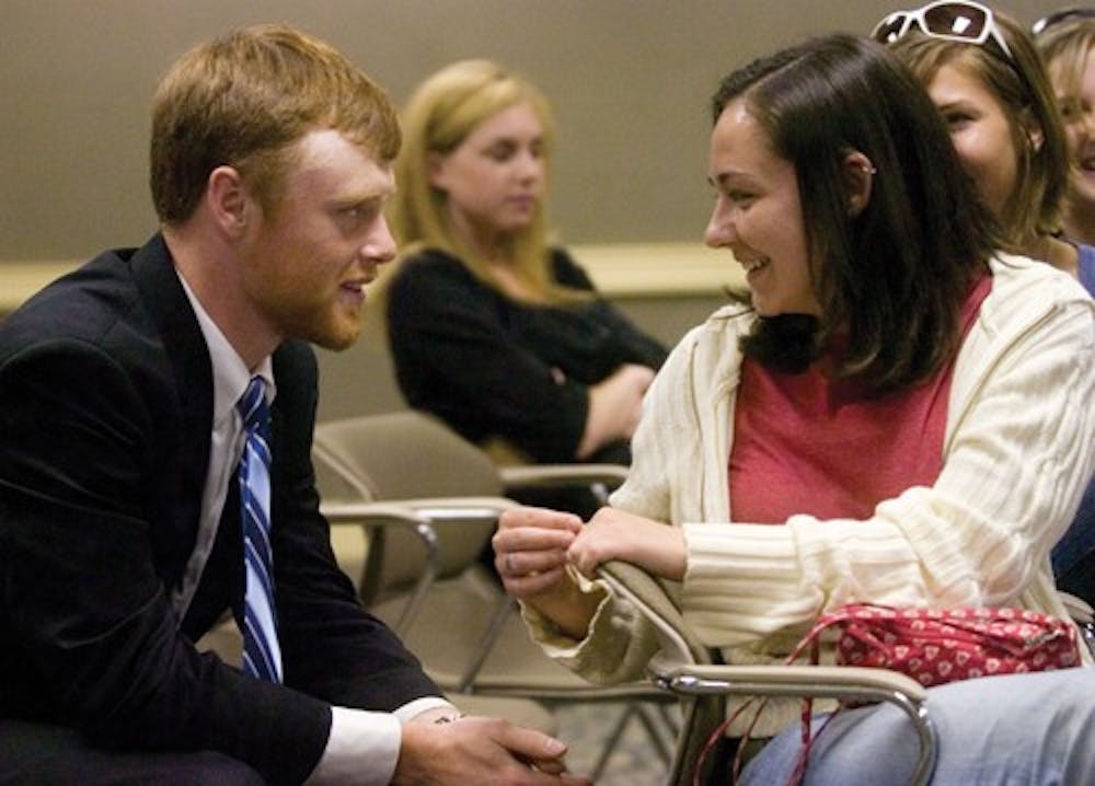 Assistant Campus editor Zachary Osterman speaks with Campus editor Audrie Garrison Friday afternoon at the Indiana Memorial Union after hearing he will be the IDS summer editor-in-chief. Trevor Brown, this semester’s managing editor, will be fall editor-in-chief.